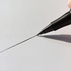 un stylo feutre qui trace une ligne droite sur un feuille